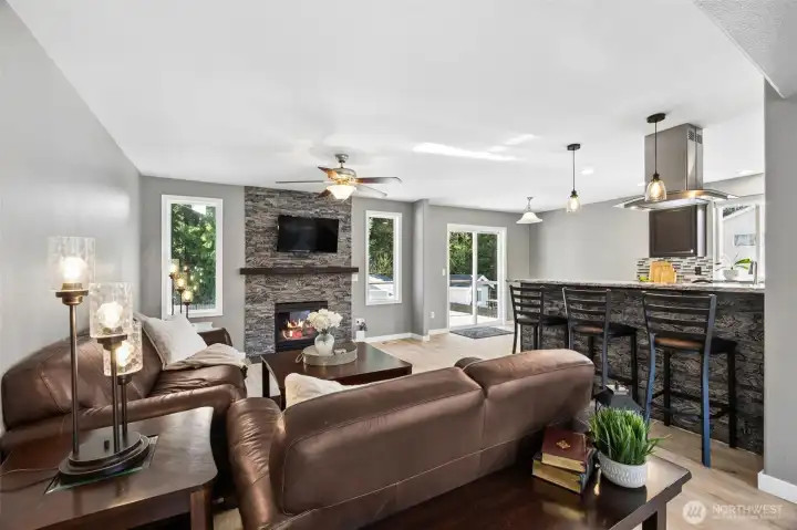 Cozy upper living room with propane fireplace