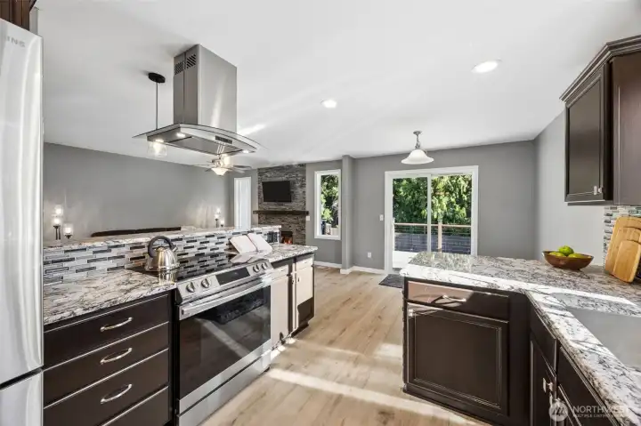 Back upper deck slider looks out to beautiful back yard