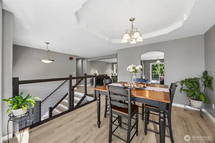 Formal dining with bay window and inlay ceilings
