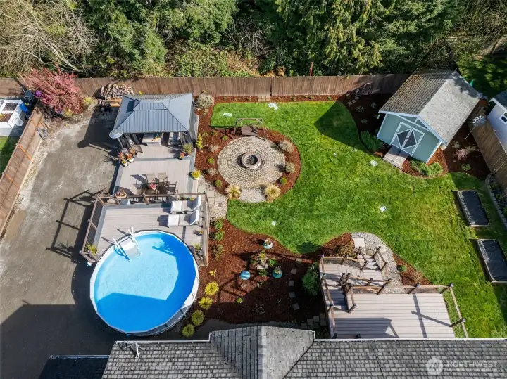 Covered pergola, pool, stick built tool shed...