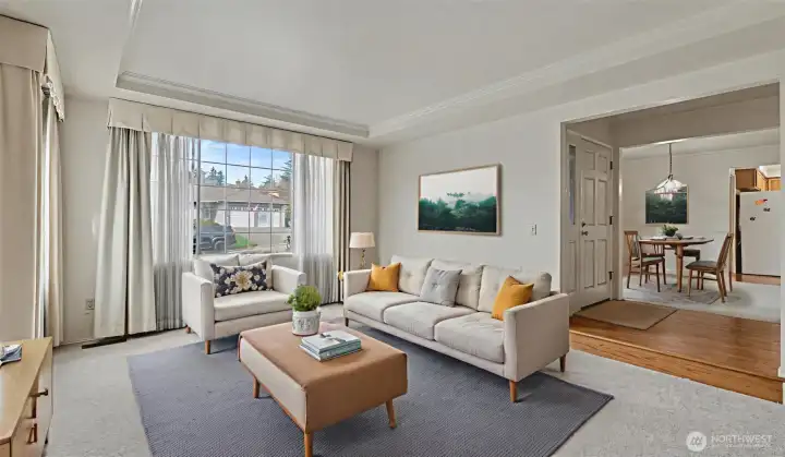 Formal living space with 2 large windows and ample natural light