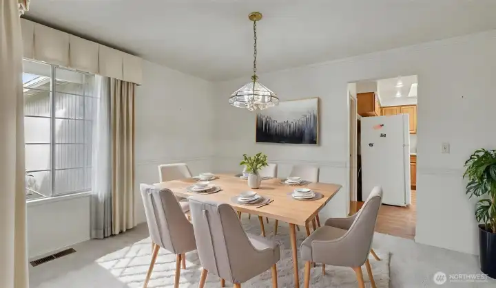 Formal dining room just steps from the kitchen and entryway