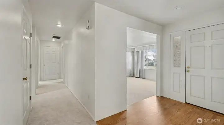 Light and bright throughout the home featuring brand new carpet and original hardwoods