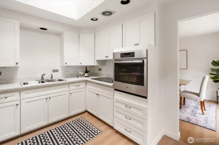 West home - 22511: Updated kitchen with new slab and stainless steel appliances.