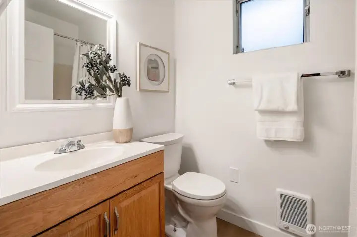 East Cottage - 22511 1/2: The private, full bathroom is tucked at the South end of the cottage.