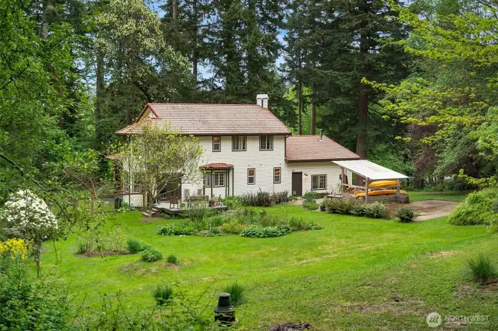 Home sits on a quiet acre above the ferries to Seattle. A very well-maintained and cared-for home. So many thoughtful details!