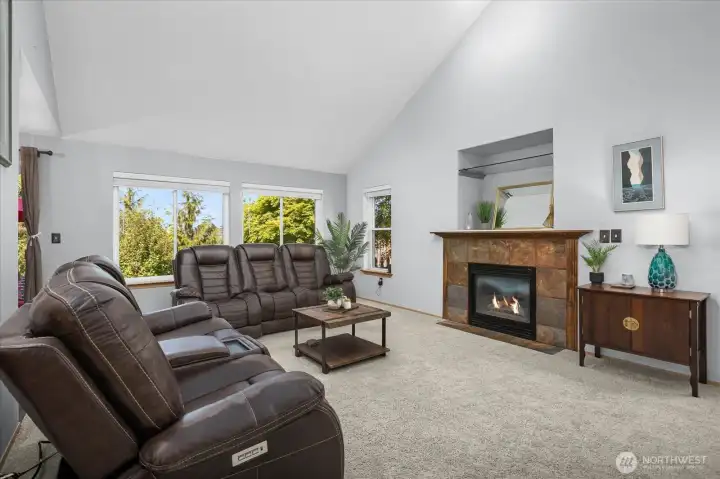 Living room, gas fireplace, vaulted ceilings.