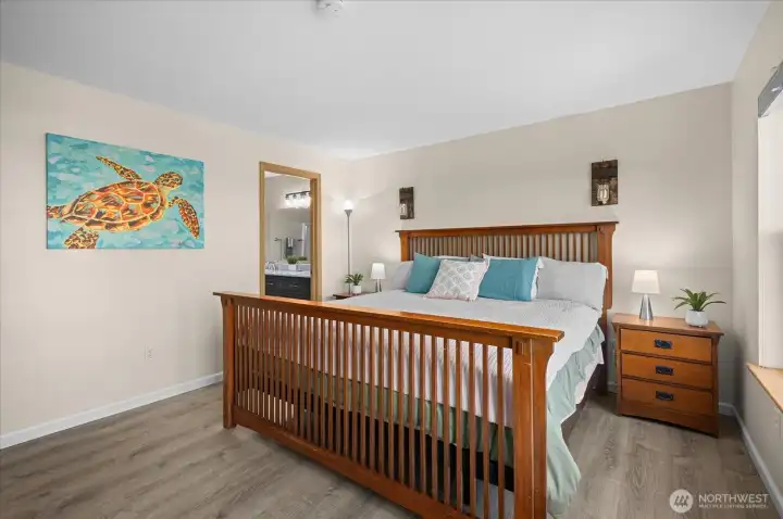 Primary Suite - En Suite bathroom with double sink- walk in shower and walk in closet.