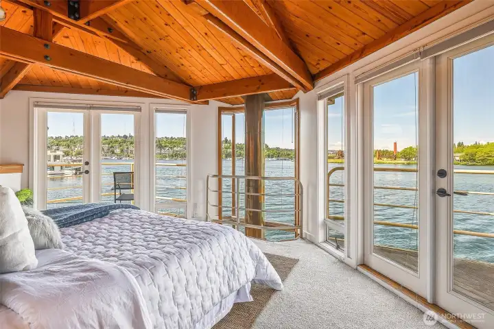 Lakeside primary suite with 2 waterside balconies
