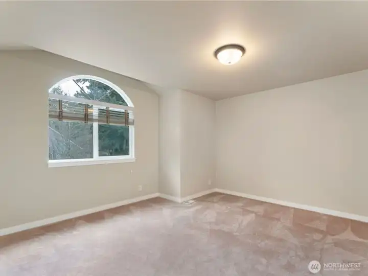 3rd bedroom - facing east. Photo depicts the room without furniture; seller furnishings are currently in the home. 3rd bedroom - facing east. Photo depicts the room without furniture; seller furnishings are currently in the home.