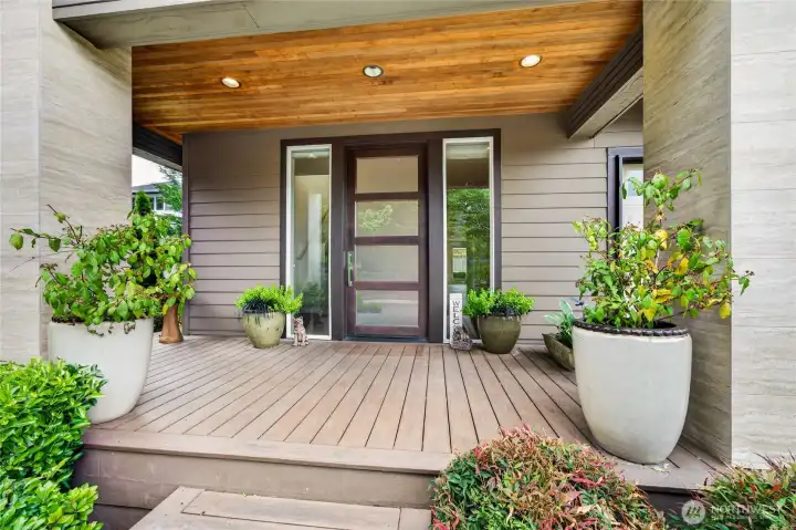 Inviting covered front porch welcomes family and guests.