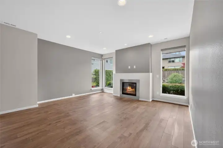 Gas fireplace serves as a warm focal point.