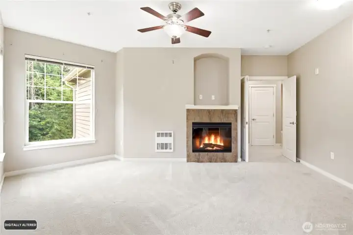 Master bedroom offers fireplace, vaulted ceilings and oversized windows