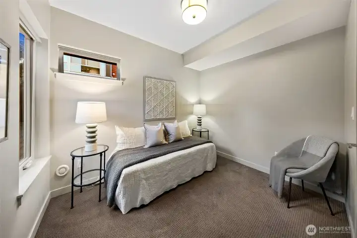 2nd bed corner wall of window light an bright