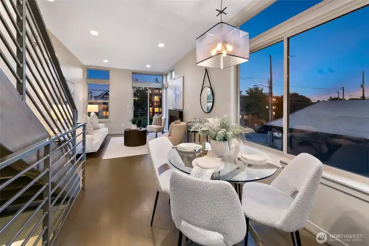Level 2 offers corner walls of window with gorgeous kitchen, dining and living area and balcony off living room