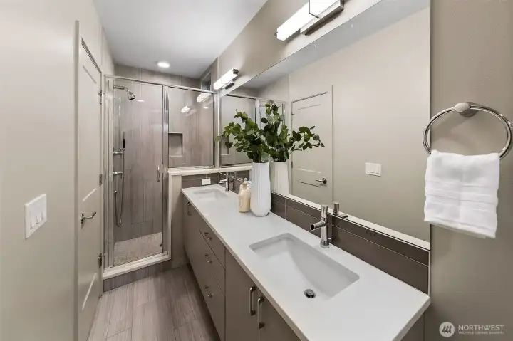 designer bath with oversized shower double vanity