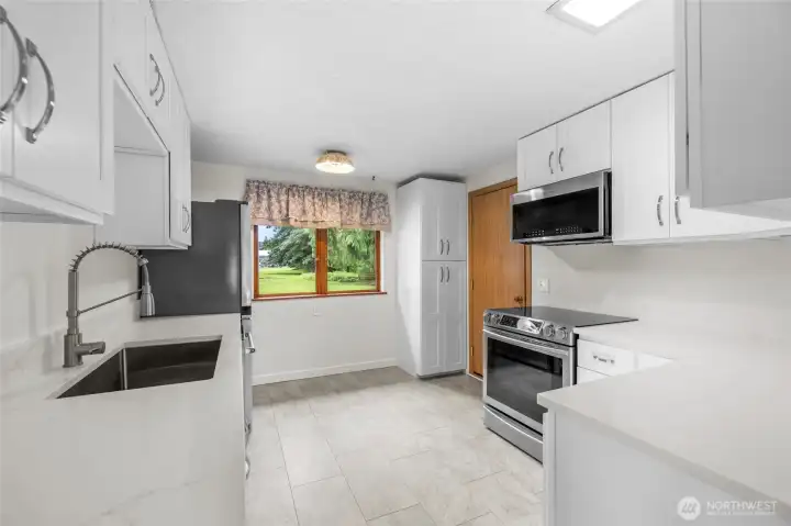 A brand new kitchen, tile floor and new appliances too! A brand new kitchen, tile floor and new appliances too!