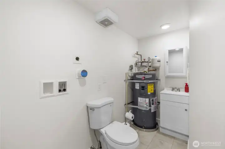 The 1/2 bath/utility room has just been updated. The 1/2 bath/utility room has just been updated.