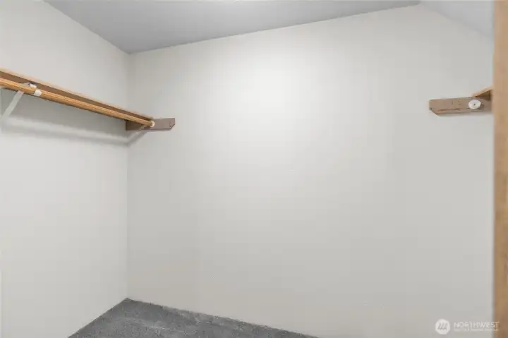 A walk in closet off the primary bedroom. A walk in closet off the primary bedroom.