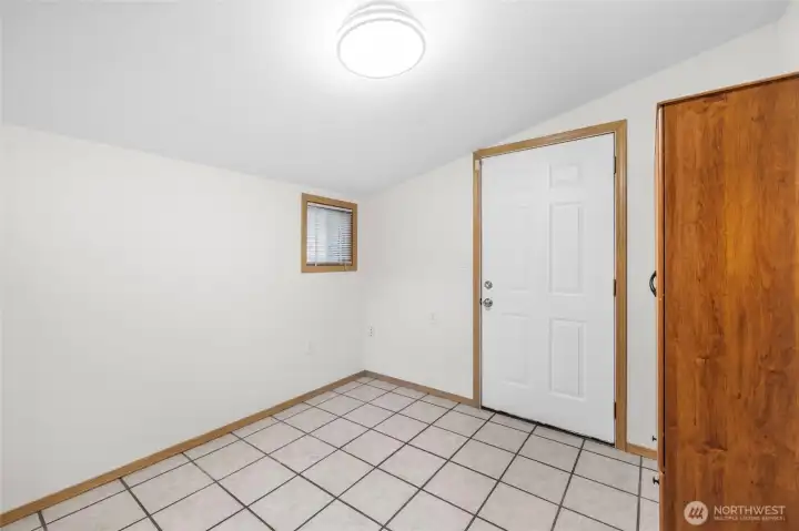 Bedroom 3 is off of the kitchen & would make a great office Bedroom 3 is off of the kitchen & would make a great office