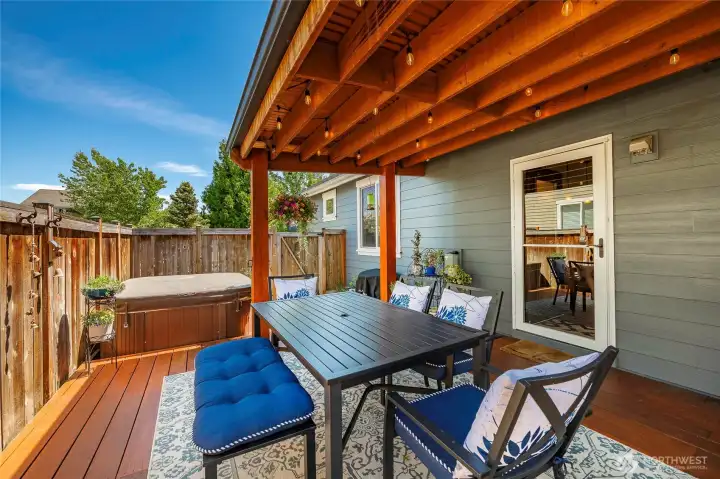Covered back patio with hot tub Covered back patio with hot tub