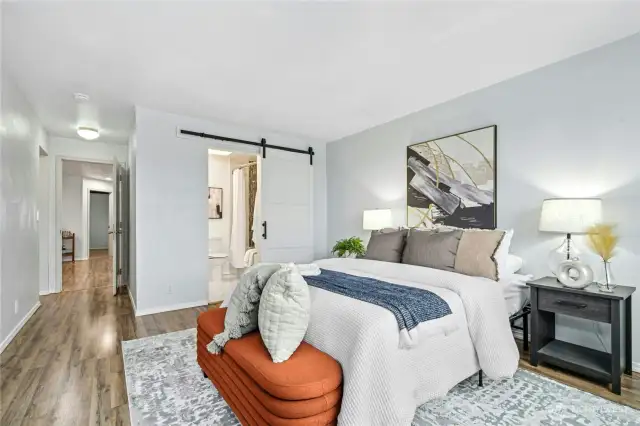 Barn door leads into the GORGEOUS remodeled owners bathroom!