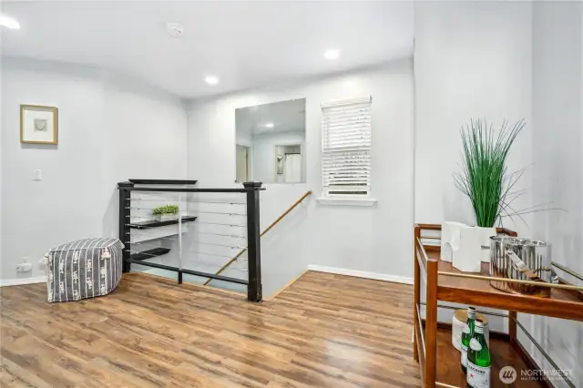 New custom modern railing was put in along with all new floors!
