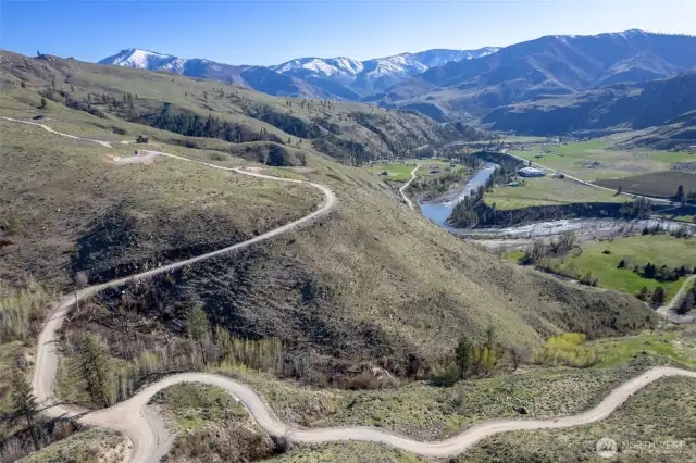 Cowboy road delivers you to the fertile beauty of lower build site or elevated you to high view setting.
