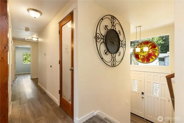 Looking dow the hallway you see the pantry on the right.