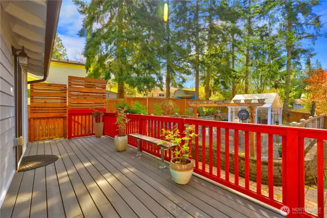 Back deck looking over the beautiful garden space in the backyard.