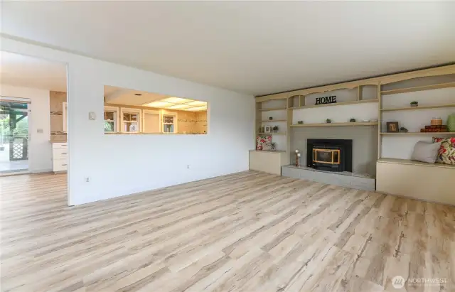 Living room to the kitchen.