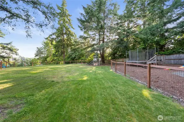 1/2 acre lot with several outdoor spaces