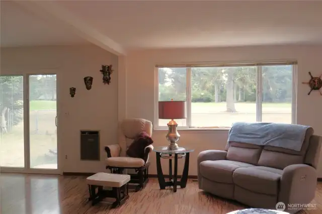 LIVING ROOM HAS  SLIDING DOORS TO THE PATIO AND 5TH FAIRWAY!