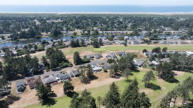 AERIAL VIEW OF THE HOME WEST TO THE GRAND CANAL AND PACIFIC OCEAN IN THE BACK GROUND!