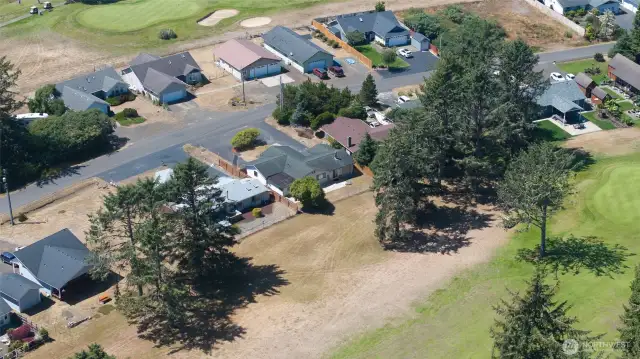 AERIAL VIEW OF THE FIFTH FAIRWAY AND BACK YARD OF THE HOME!