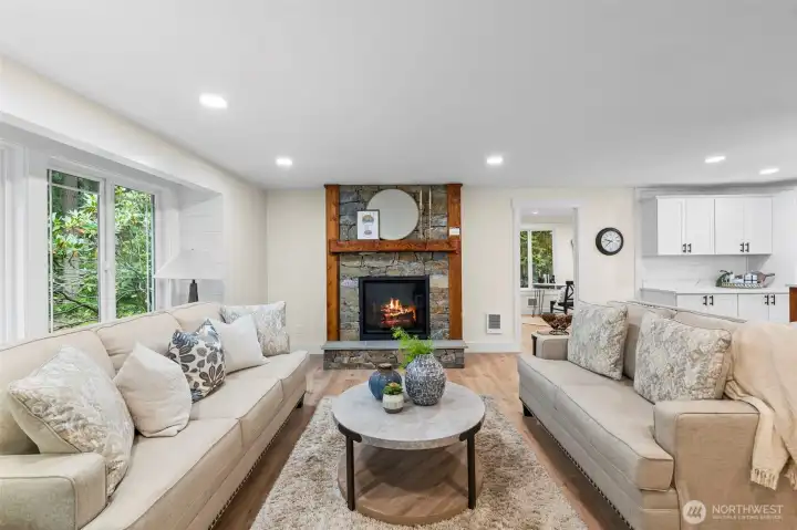 Great room features new propane fireplace with beautiful stonework, hearth and mantel.  Perfect for cozy fall nights!