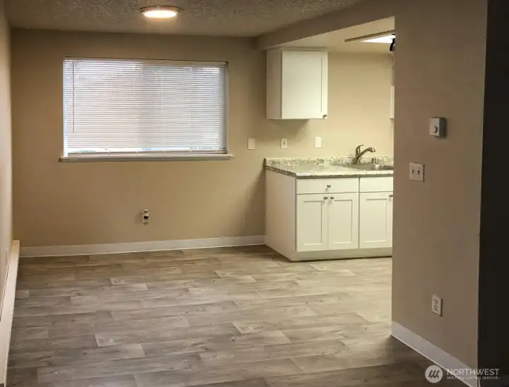 laminate counters, shake style cabinetry and stainless steel appliances.