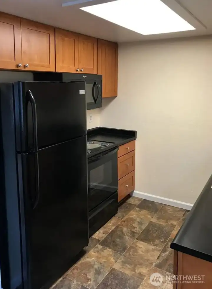 Unit 3 kitchen, plenty of storage and ease to clean countertops.