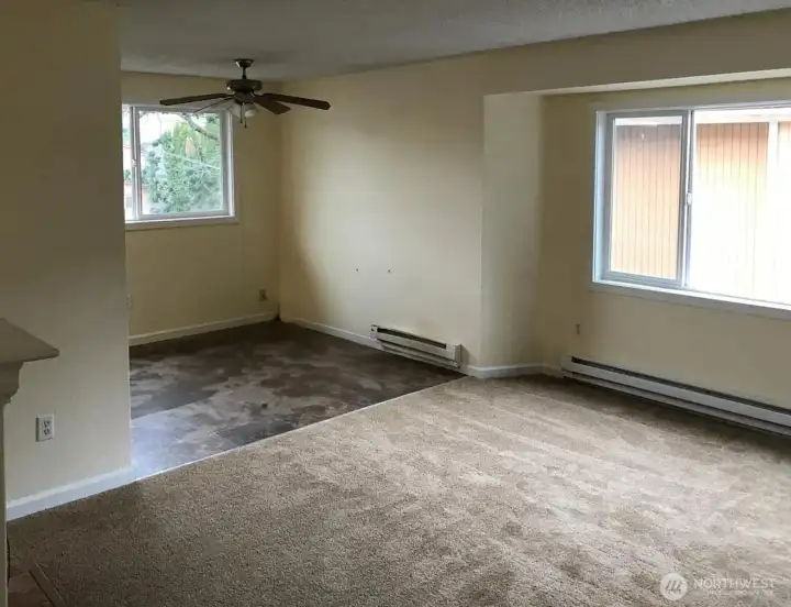 Open living room to dining room layout, lots of natural light!