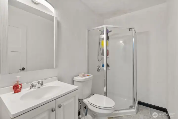 3/4 bath servicing Bedrooms 1 & 2