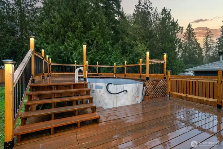 New deck surrounding the above-ground pool.
