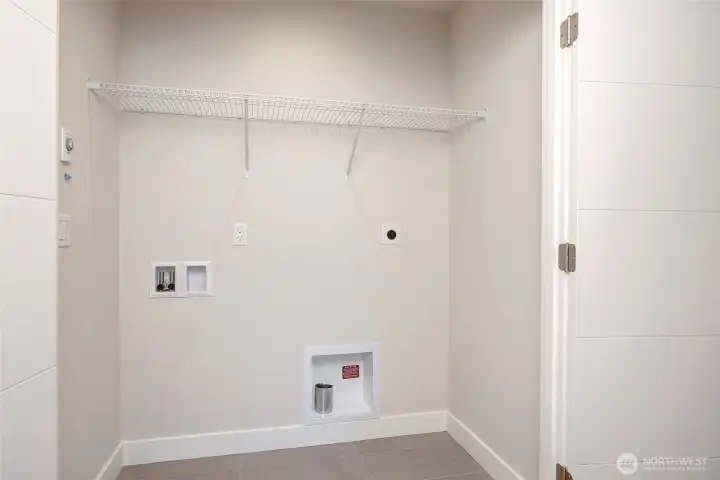 Built In Laundry Space Located Near Bedrooms