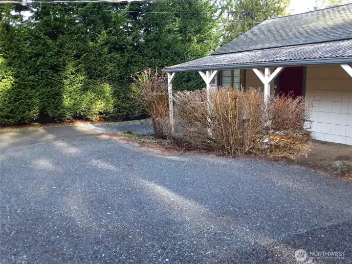 Not only are there 4 covered parking places, there's also lot of driveway parking