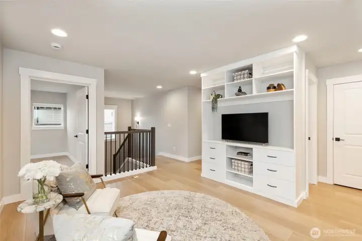 Light-filled loft with custom built-ins—perfect for work or relaxation.