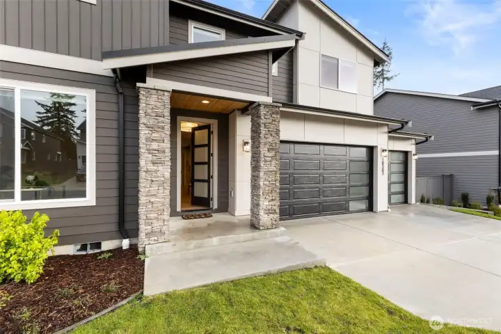 A statement front door sets the tone for the elevated finishes found throughout.