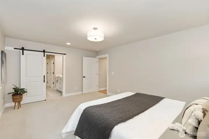 Spacious primary suite offering a peaceful retreat.