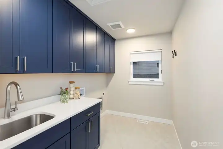 Laundry room designed for efficiency and everyday convenience.