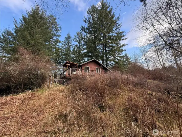 Sweet little cabin in the woods. Exceptional privacy with room to expand. 3BD septic system, private well and Rock Island fiber