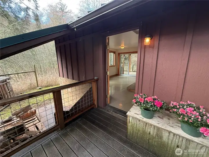 Convenient covered wood storage for the wood stove