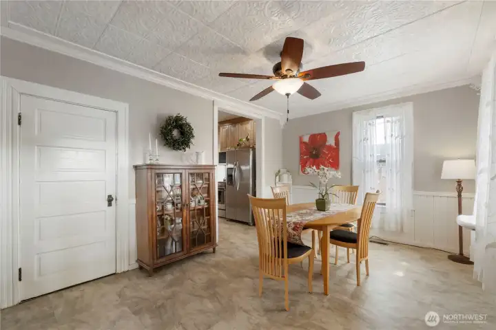 Dining room with tin-type old-world ceiling accents
